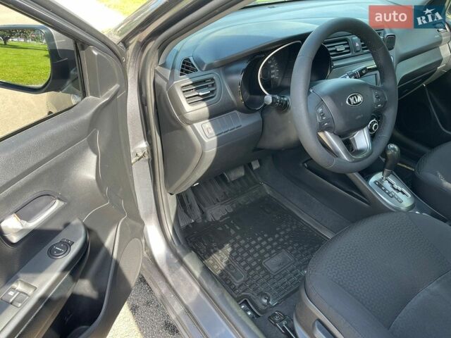 Сірий Кіа Ріо, об'ємом двигуна 1.6 л та пробігом 148 тис. км за 8300 $, фото 9 на Automoto.ua