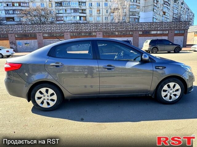Серый Киа Рио, объемом двигателя 1.4 л и пробегом 103 тыс. км за 9000 $, фото 5 на Automoto.ua