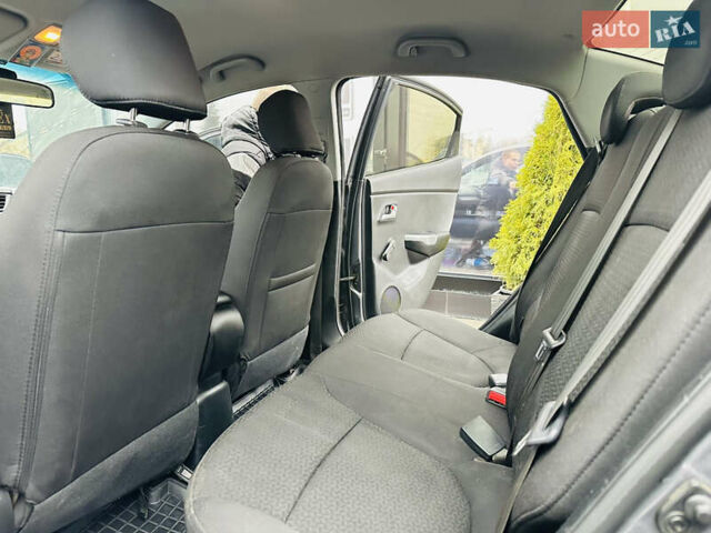 Серый Киа Рио, объемом двигателя 1.4 л и пробегом 245 тыс. км за 5900 $, фото 15 на Automoto.ua