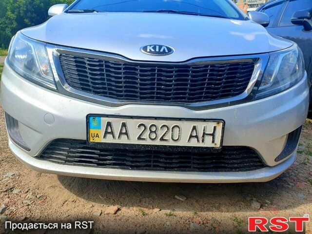 Серый Киа Рио, объемом двигателя 1.4 л и пробегом 145 тыс. км за 8210 $, фото 5 на Automoto.ua
