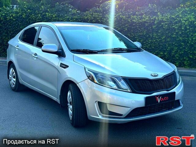 Сірий Кіа Ріо, об'ємом двигуна 1.4 л та пробігом 230 тис. км за 5799 $, фото 2 на Automoto.ua