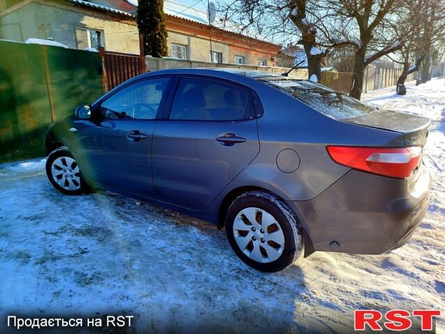 Серый Киа Рио, объемом двигателя 1.4 л и пробегом 24500 тыс. км за 5500 $, фото 3 на Automoto.ua