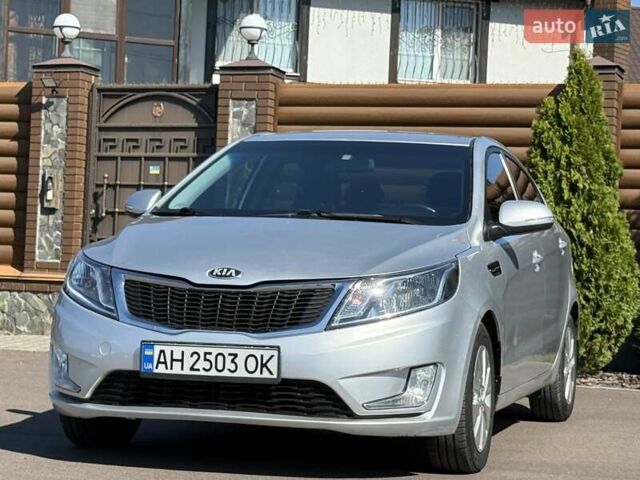 Серый Киа Рио, объемом двигателя 1.59 л и пробегом 131 тыс. км за 8800 $, фото 2 на Automoto.ua