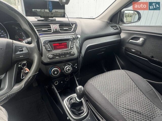 Серый Киа Рио, объемом двигателя 1.4 л и пробегом 319 тыс. км за 6490 $, фото 20 на Automoto.ua