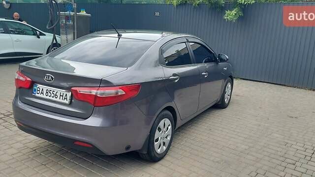 Серый Киа Рио, объемом двигателя 1.4 л и пробегом 150 тыс. км за 8600 $, фото 3 на Automoto.ua