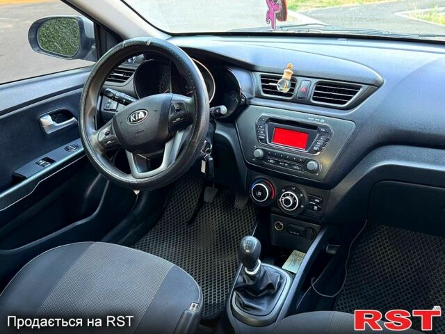 Сірий Кіа Ріо, об'ємом двигуна 1.4 л та пробігом 230 тис. км за 5799 $, фото 5 на Automoto.ua