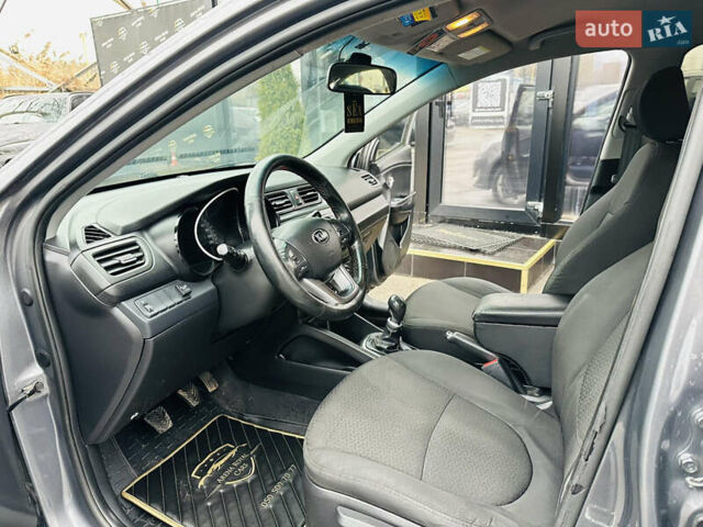 Серый Киа Рио, объемом двигателя 1.4 л и пробегом 245 тыс. км за 5900 $, фото 12 на Automoto.ua