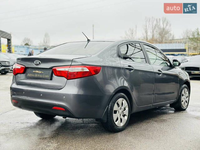 Серый Киа Рио, объемом двигателя 1.4 л и пробегом 245 тыс. км за 5900 $, фото 9 на Automoto.ua