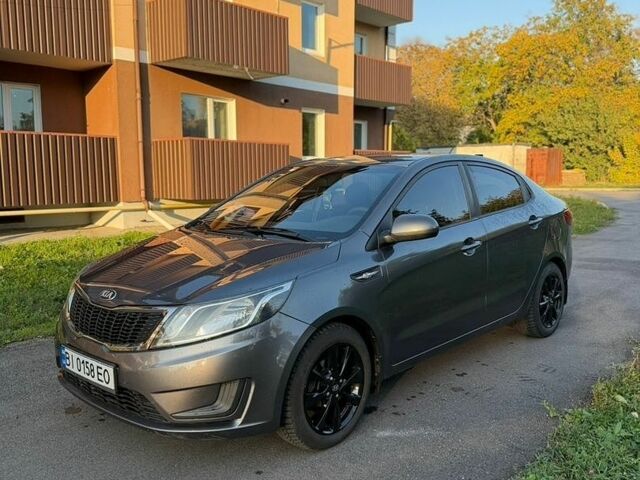 Сірий Кіа Ріо, об'ємом двигуна 1.4 л та пробігом 174 тис. км за 8400 $, фото 3 на Automoto.ua