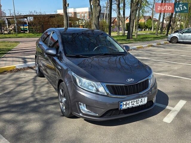 Серый Киа Рио, объемом двигателя 1.4 л и пробегом 97 тыс. км за 8700 $, фото 1 на Automoto.ua