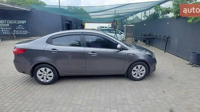 Серый Киа Рио, объемом двигателя 1.4 л и пробегом 150 тыс. км за 8600 $, фото 7 на Automoto.ua