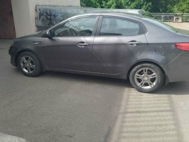 Сірий Кіа Ріо, об'ємом двигуна 1.4 л та пробігом 76 тис. км за 8999 $, фото 1 на Automoto.ua