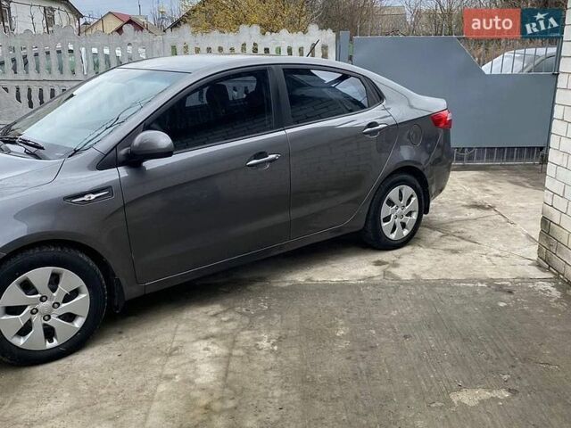 Серый Киа Рио, объемом двигателя 1.4 л и пробегом 195 тыс. км за 6500 $, фото 4 на Automoto.ua