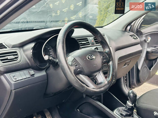 Серый Киа Рио, объемом двигателя 1.4 л и пробегом 245 тыс. км за 5900 $, фото 13 на Automoto.ua