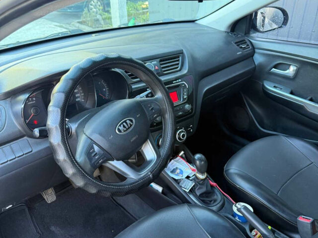 Серый Киа Рио, объемом двигателя 1.4 л и пробегом 223 тыс. км за 7399 $, фото 4 на Automoto.ua