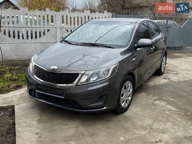Серый Киа Рио, объемом двигателя 1.4 л и пробегом 195 тыс. км за 6500 $, фото 3 на Automoto.ua