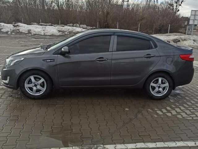Сірий Кіа Ріо, об'ємом двигуна 1.4 л та пробігом 130 тис. км за 7000 $, фото 2 на Automoto.ua
