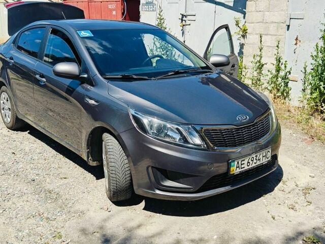 Серый Киа Рио, объемом двигателя 1.4 л и пробегом 190 тыс. км за 7000 $, фото 1 на Automoto.ua