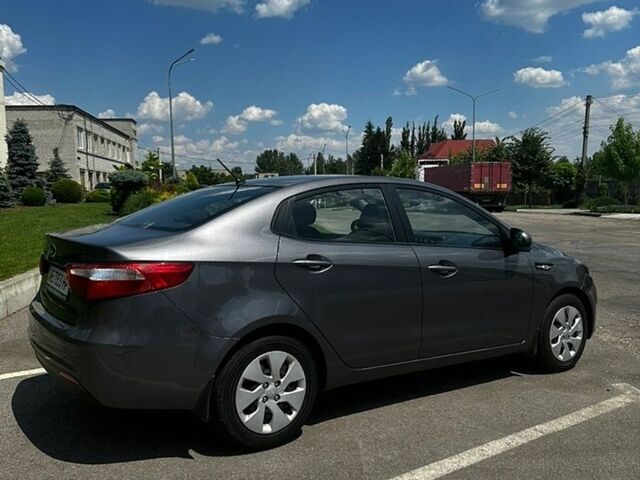 Серый Киа Рио, объемом двигателя 1.4 л и пробегом 30 тыс. км за 9900 $, фото 4 на Automoto.ua