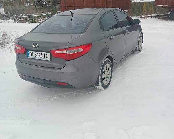 Серый Киа Рио, объемом двигателя 1.4 л и пробегом 300 тыс. км за 5850 $, фото 3 на Automoto.ua