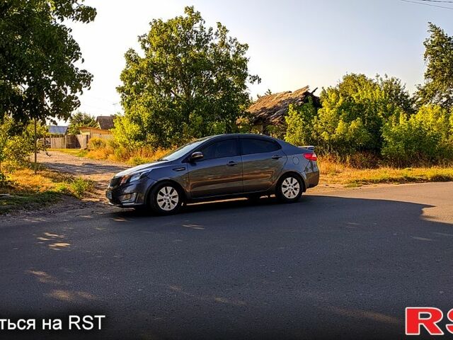 Серый Киа Рио, объемом двигателя 1.6 л и пробегом 980 тыс. км за 7900 $, фото 1 на Automoto.ua