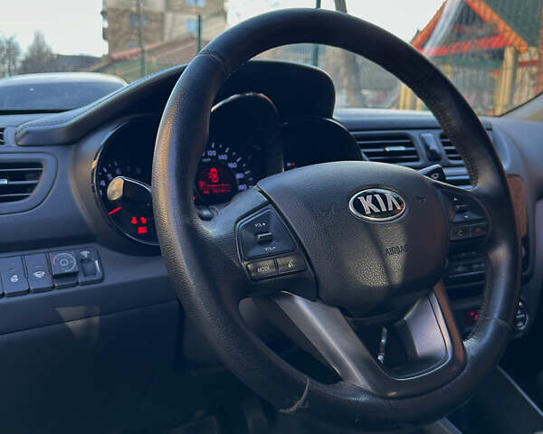 Серый Киа Рио, объемом двигателя 1.6 л и пробегом 96 тыс. км за 10800 $, фото 9 на Automoto.ua