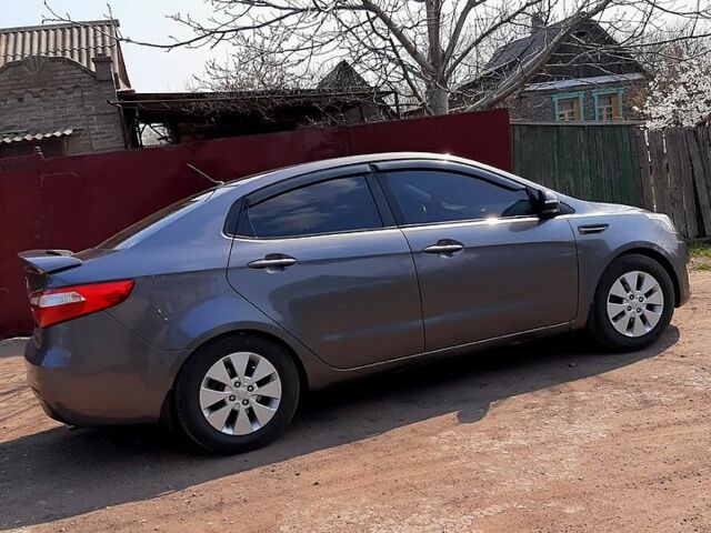 Серый Киа Рио, объемом двигателя 1.6 л и пробегом 980 тыс. км за 7900 $, фото 2 на Automoto.ua