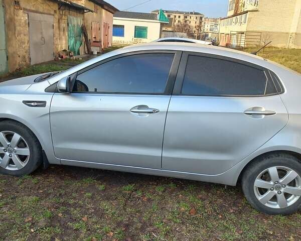 Серый Киа Рио, объемом двигателя 1.4 л и пробегом 53 тыс. км за 8300 $, фото 4 на Automoto.ua