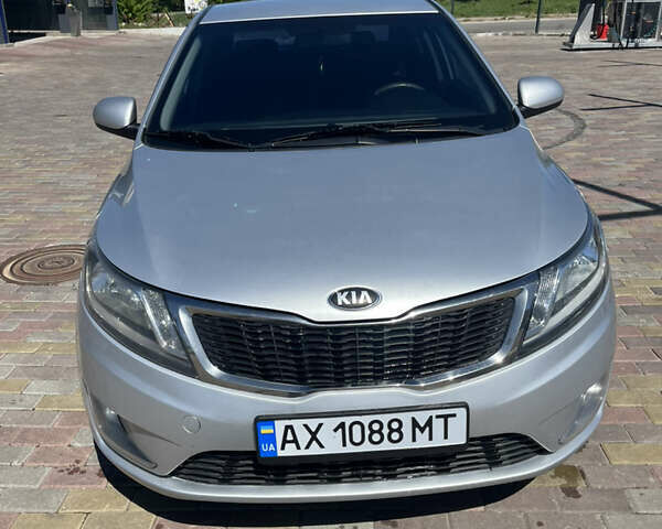 Серый Киа Рио, объемом двигателя 1.4 л и пробегом 203 тыс. км за 6500 $, фото 2 на Automoto.ua