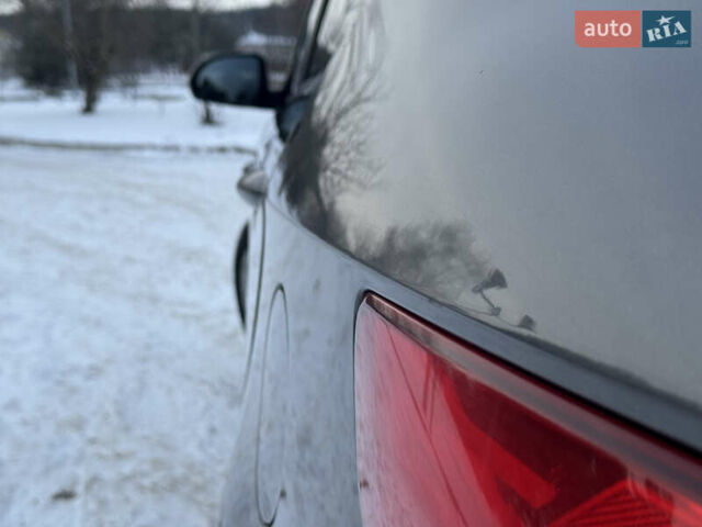 Серый Киа Рио, объемом двигателя 1.4 л и пробегом 260 тыс. км за 7799 $, фото 7 на Automoto.ua