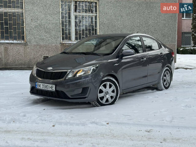 Серый Киа Рио, объемом двигателя 1.4 л и пробегом 260 тыс. км за 7799 $, фото 1 на Automoto.ua