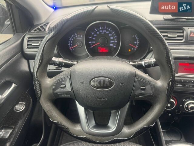 Серый Киа Рио, объемом двигателя 1.4 л и пробегом 319 тыс. км за 6490 $, фото 14 на Automoto.ua