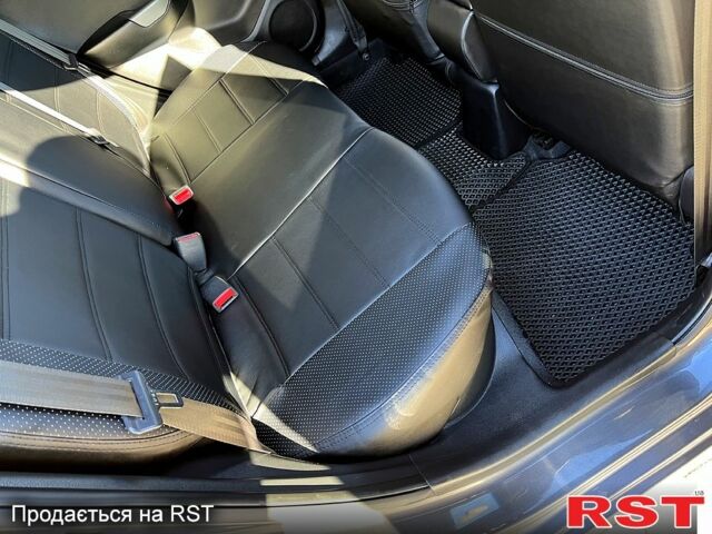 Серый Киа Рио, объемом двигателя 1.4 л и пробегом 75 тыс. км за 9100 $, фото 9 на Automoto.ua