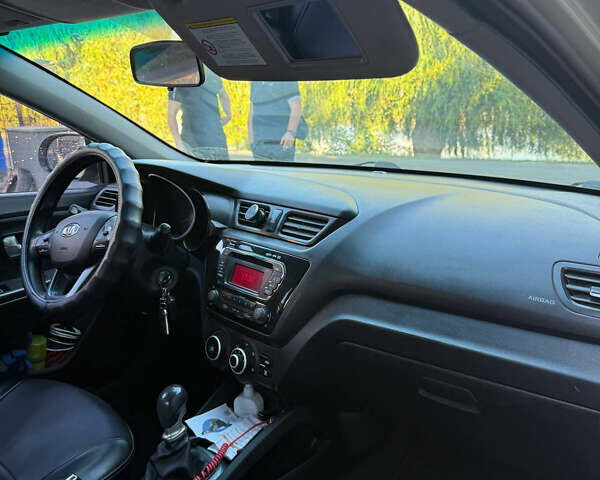 Серый Киа Рио, объемом двигателя 1.4 л и пробегом 223 тыс. км за 7399 $, фото 5 на Automoto.ua