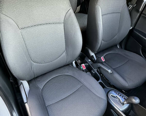 Серый Киа Рио, объемом двигателя 1.4 л и пробегом 88 тыс. км за 9000 $, фото 15 на Automoto.ua