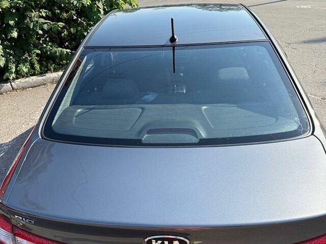 Сірий Кіа Ріо, об'ємом двигуна 1.4 л та пробігом 131 тис. км за 7400 $, фото 4 на Automoto.ua
