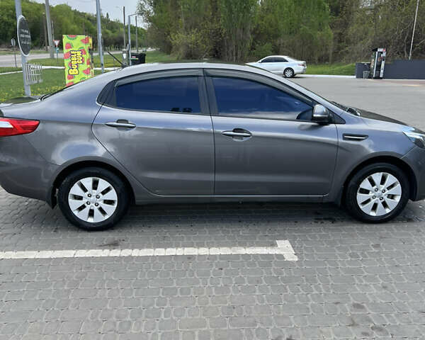 Серый Киа Рио, объемом двигателя 1.59 л и пробегом 165 тыс. км за 8100 $, фото 3 на Automoto.ua