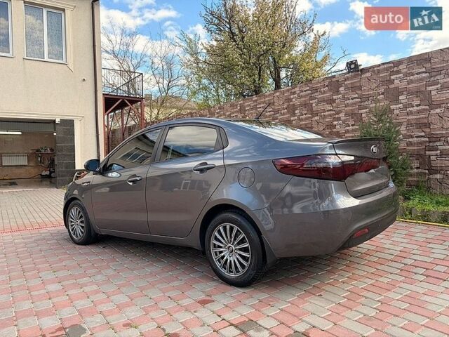 Серый Киа Рио, объемом двигателя 1.4 л и пробегом 231 тыс. км за 7800 $, фото 1 на Automoto.ua