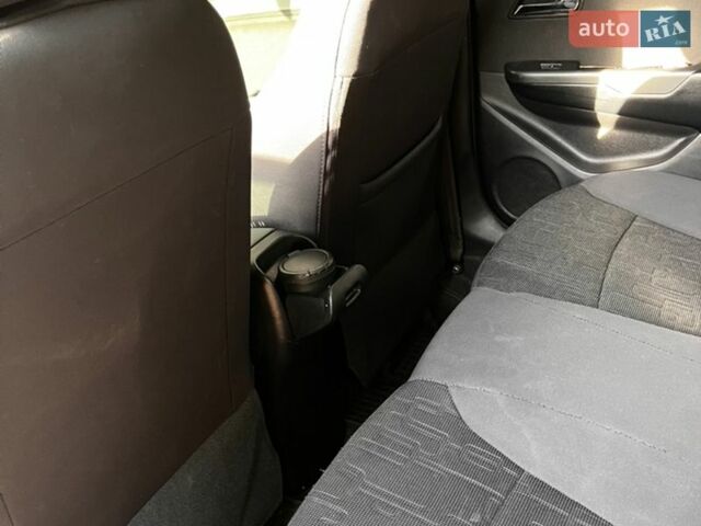 Серый Киа Рио, объемом двигателя 1.59 л и пробегом 136 тыс. км за 10300 $, фото 17 на Automoto.ua