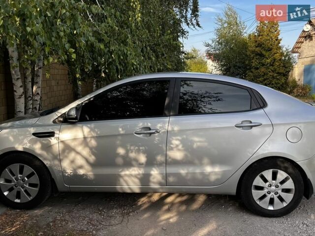 Серый Киа Рио, объемом двигателя 1.59 л и пробегом 136 тыс. км за 10300 $, фото 2 на Automoto.ua