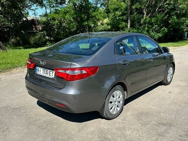Серый Киа Рио, объемом двигателя 1.59 л и пробегом 140 тыс. км за 6600 $, фото 3 на Automoto.ua
