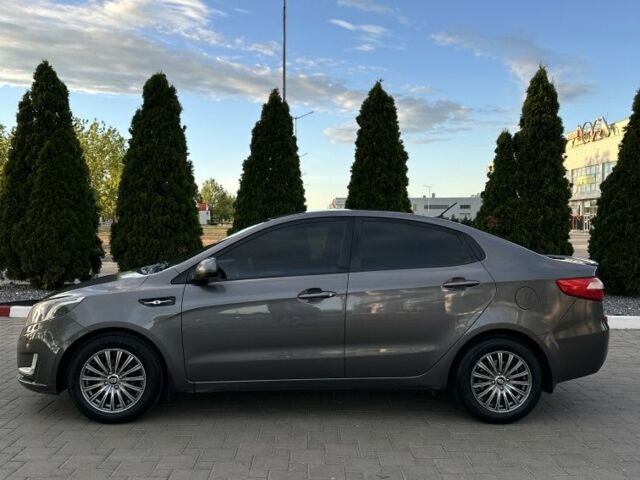 Сірий Кіа Ріо, об'ємом двигуна 1.4 л та пробігом 230 тис. км за 7300 $, фото 4 на Automoto.ua