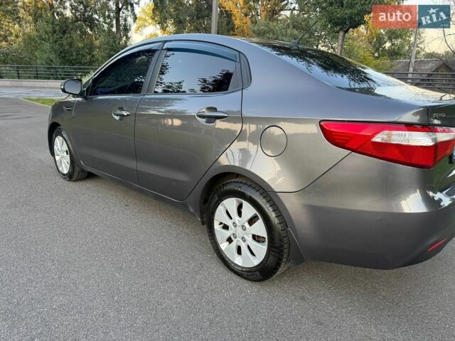 Сірий Кіа Ріо, об'ємом двигуна 1.6 л та пробігом 173 тис. км за 8900 $, фото 4 на Automoto.ua