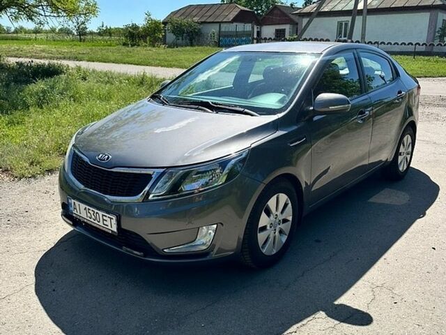 Серый Киа Рио, объемом двигателя 1.59 л и пробегом 140 тыс. км за 6600 $, фото 1 на Automoto.ua
