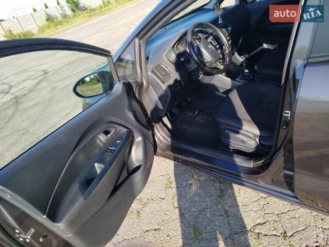 Сірий Кіа Ріо, об'ємом двигуна 1.4 л та пробігом 80 тис. км за 9500 $, фото 11 на Automoto.ua
