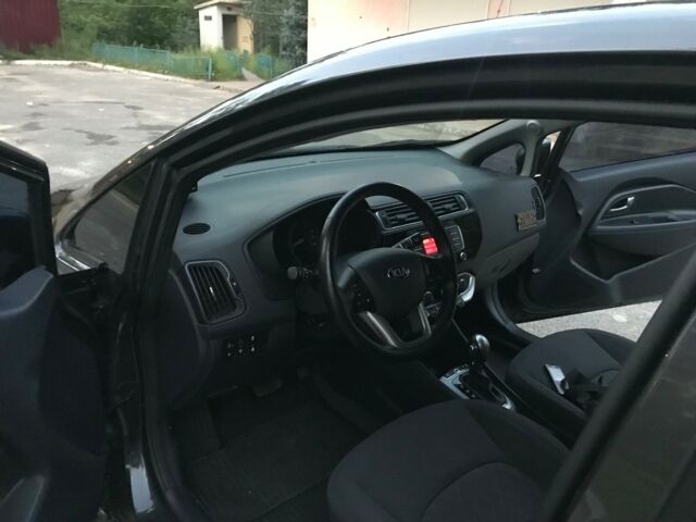 Серый Киа Рио, объемом двигателя 1.4 л и пробегом 20 тыс. км за 12500 $, фото 3 на Automoto.ua