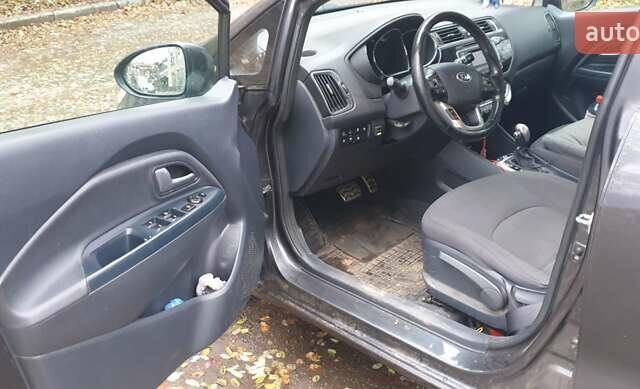 Серый Киа Рио, объемом двигателя 1.4 л и пробегом 145 тыс. км за 10400 $, фото 4 на Automoto.ua