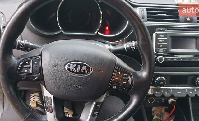 Серый Киа Рио, объемом двигателя 1.4 л и пробегом 145 тыс. км за 10400 $, фото 11 на Automoto.ua