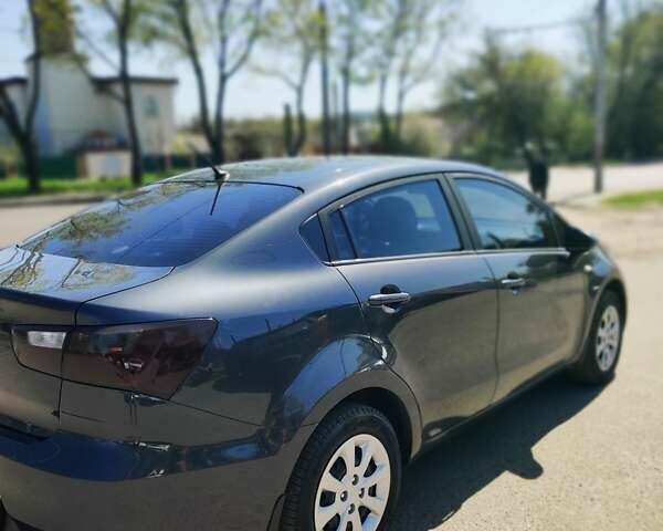 Серый Киа Рио, объемом двигателя 1.4 л и пробегом 72 тыс. км за 9800 $, фото 2 на Automoto.ua