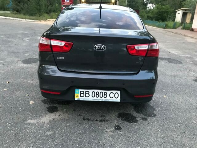 Серый Киа Рио, объемом двигателя 1.4 л и пробегом 20 тыс. км за 12500 $, фото 9 на Automoto.ua